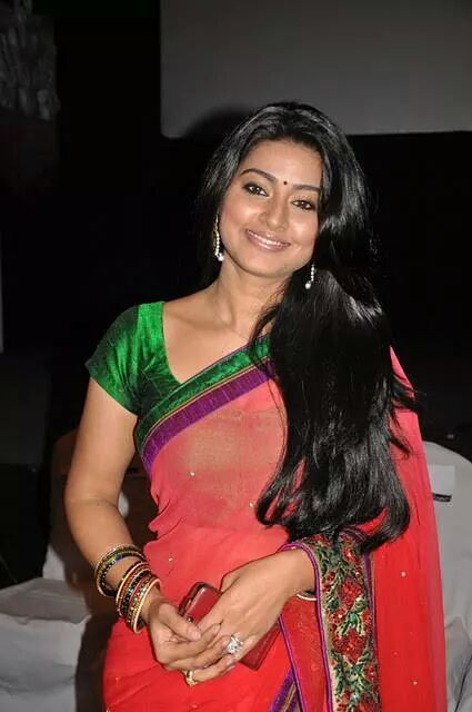Sneha in red and green saree