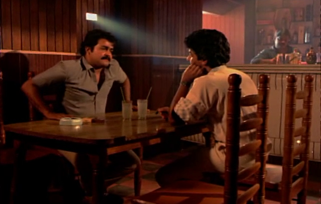 Mohanlal and Ashokan in a bar