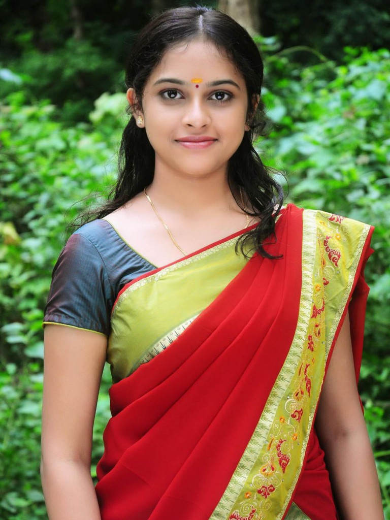 Sri Divya in red saree